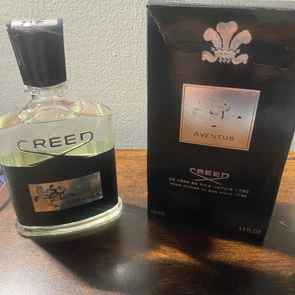Creed Aventus with Black and Silver Detailing
